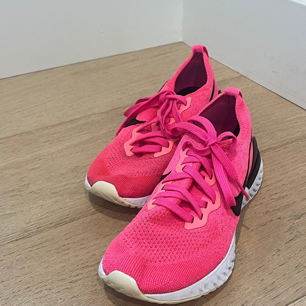 Pink nike running shoes
